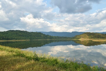 Obraz na płótnie Canvas landscape of water reservoir lake with mountain background