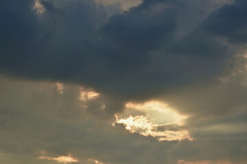 Naklejka na ściany i meble cloud spreading on sunset twilight sky in evening