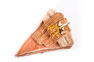 Obraz premium Piece of chocolate cake with icing on white isolated background