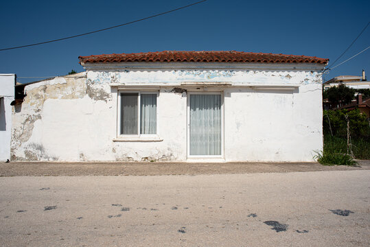 Koronisia, Epirus, Greece - March 29, 2018: House in white