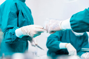 The surgeon is working in a hospital operating room. Healthcare and Medicine. Doctor posing with mask in the emergency room.