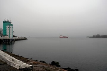 The ship goes to sea in the rain, the town of Baltiysk, Kaliningrad region, Russia