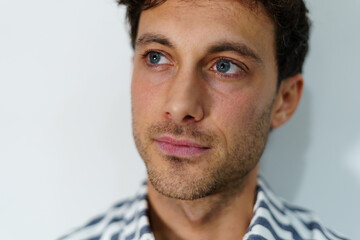 Selective focus of a eyes of a man with thoughtful expression