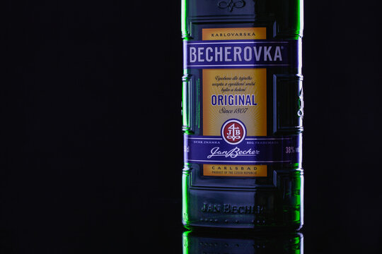 Bottle of Becherovka on the black background