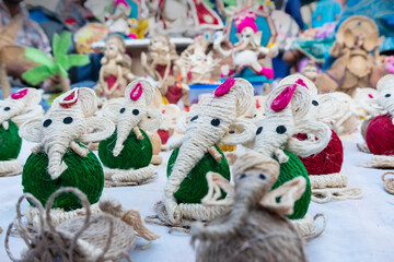 Lord Ganesha dolls made from jute, Handicrafts for sale at Kolkata handicrafts fair, West Bengal,...