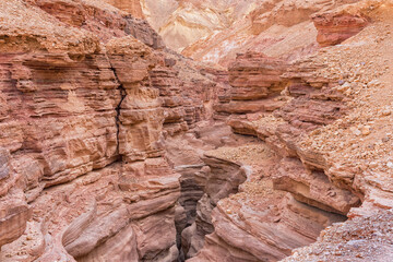 The Red Canyon in Israel is the route in the Eilat Mountains. The wadi carves its way deep into red sandstone, creating a narrow and impressive canyon
