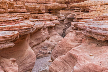 The Red Canyon in Israel. The wadi carves its way deep into red sandstone, creating a narrow and impressive canyon