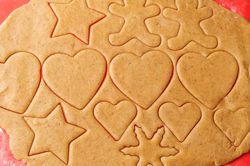 Unbaked cookies in the shape of heart and star for St. Valentines Day. Homemade pastry.