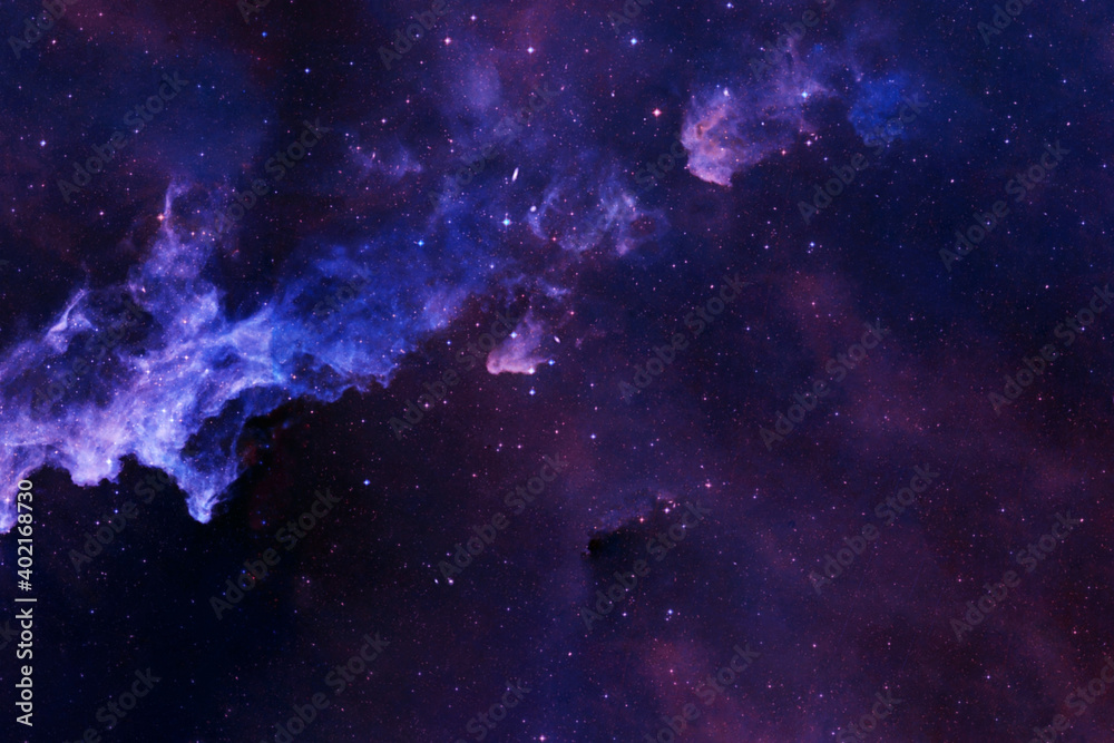 Wall mural a blue galaxy with stars and nebulae. elements of this image were furnished by nasa.