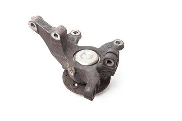 A close-up of a worn metal wheel hub with oil and rust elements on a white background. Seasonal...