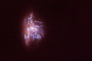 A blue galaxy with stars and nebulae. Elements of this image were furnished by NASA.