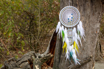 Handmade dream catcher with feathers threads and beads rope hanging