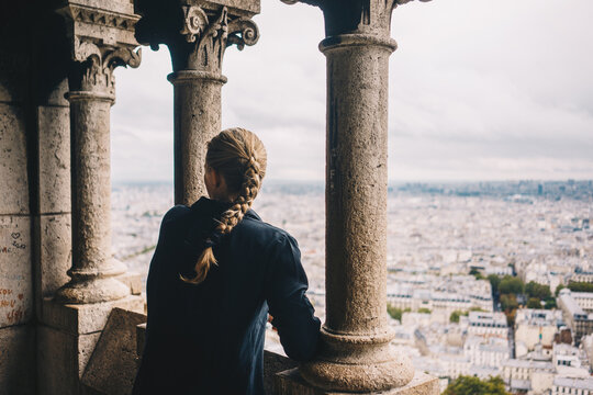 Woman overlooking Paris from above