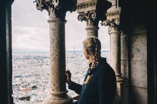 Woman overlooking Paris from above