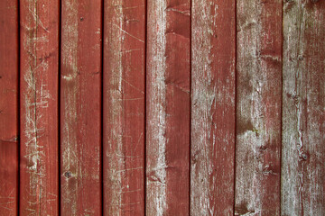 Red distressed wooden wall