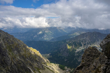 Fototapeta na wymiar Clouds over the peaks of the High Tatras.