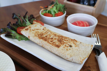 taco ,vegetable roll or salad roll or burrito