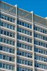 Fototapeta premium Perspective of the modern square building facade