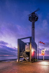 Radar installation on a pier at twilight, Port of Antwerp, Belgium.