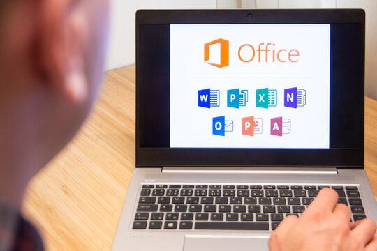 Office 365 is used by a man on the laptop. Microsoft customer used computer software. New product is tested by IT specialist. San Francisco, February 2020.