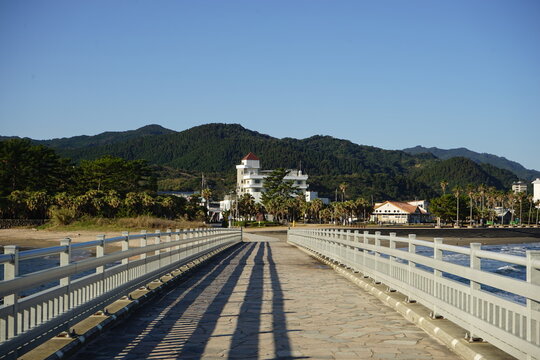 Bridge towards Oni no Sentakuita or Devil's Washboard, which are naturally formed geological exposed basalt rock formations in Aoshima Island, Miyazaki, Japan - 宮崎 青島 鬼の洗濯板 弥生橋
