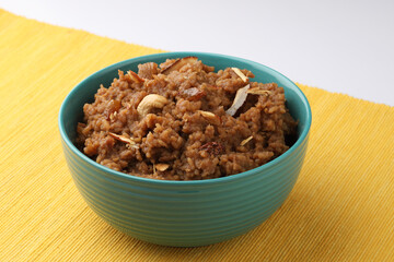 South Indian Sweet pongal made from rice, milk, jaggery and dry fruits.coconutsweet pongal