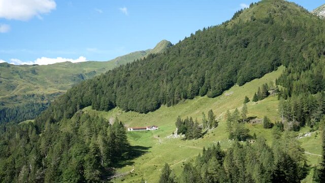 landscape of Carnic Alps with Alpine hut (Malga), Udine, Friuli Venezia Giulia, Italy