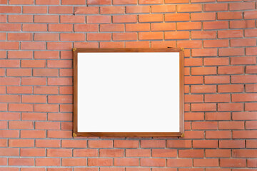 Mockup of Blank photo frames display on the brick wall in coffee shop for your design