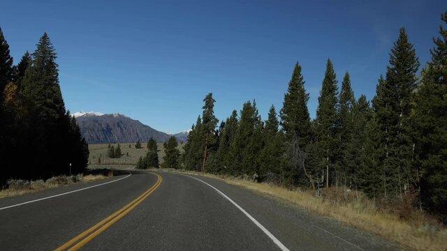 View Driving Around Curve In Mountains