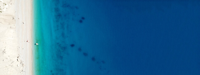 Aerial drone ultra wide panoramic photo of famous azure sandy beach of Egremni, Lefkada island, Ionian, Greece