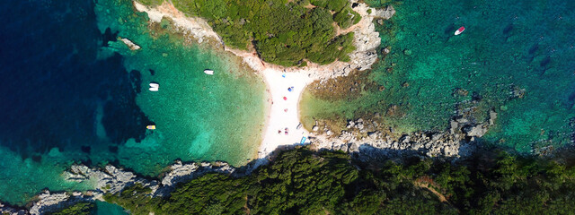 Aerial drone ultra wide panoramic photo of tropical exotic beach with deep turquoise crystal clear sea