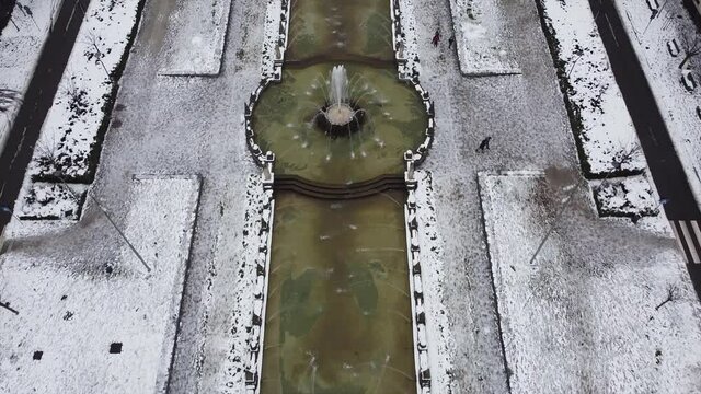 ITALY, MILAN 12-29-2020, drone aerial view of Il Dritto The Straight One, Generali Lo Storto The Twisted One, PwC Il Curvo The Curved On in citylife district  shopping area with snow