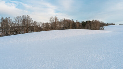 risdalen valley at toten, norway, through snow covered fields