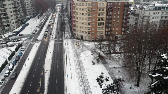 ITALY, MILAN 12-29-2020, drone aerial view of Il Dritto The Straight One, Generali Lo Storto The Twisted One, PwC Il Curvo The Curved On in citylife district  shopping area with snow