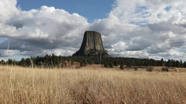 View Of Devils Tower Pulling Back Through Grassy Field