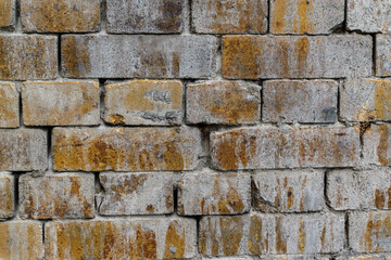 Old fire brick wall. Yellow-brown color.