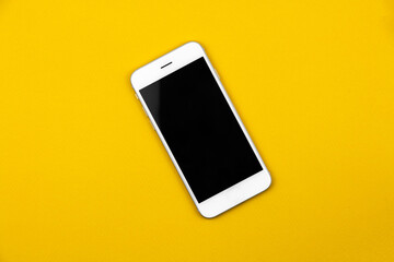 Black white blank smartphone on isolated yellow background, mockup and concept design, template 