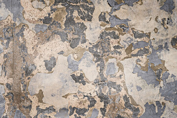 cracked concrete wall covered with gray cement surface as background