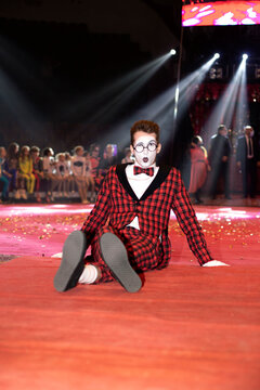 mime guy sitting on the floor