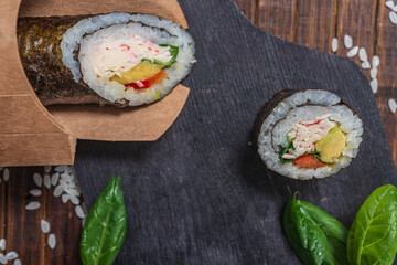 Still life. Japanese cuisine- roll in a package