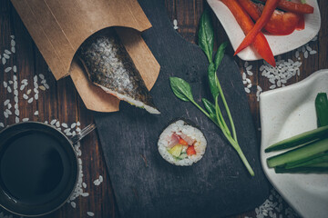 Still life. Japanese cuisine- roll in a package