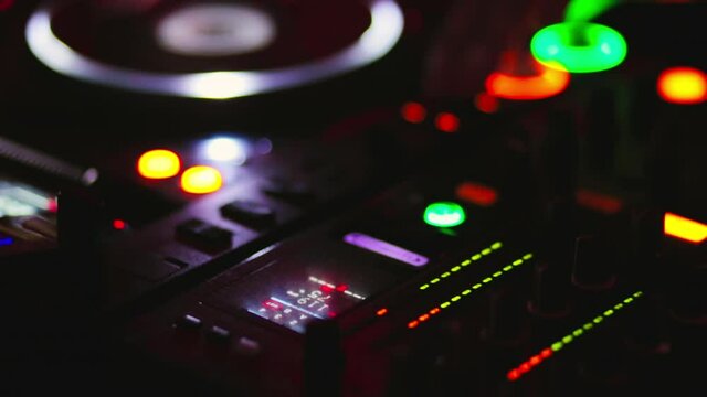 dj mixer in a nightclub