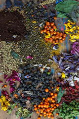 Naklejka na ściany i meble colored seeds and spices poured on the table form a beautiful background of color and texture
