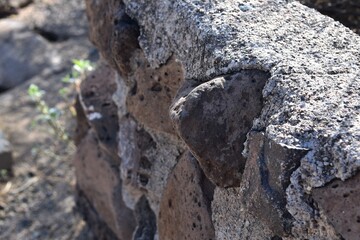 Close up of a rock in a wall
