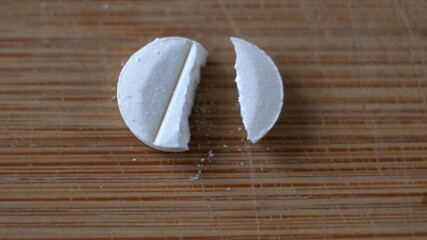 Breaking Drugs Pill into Pieces Close-Up