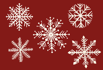 Obraz na płótnie Canvas Set of watercolor snowflakes on red background