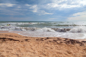 Sea beach on a bright summer day. Relaxing picture of the perfect sea holiday.