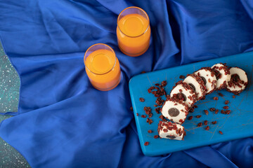 Two glass pitchers with delicious orange juice