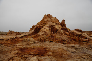 Fototapeta premium colored stones in a volcanic crater falling from the heat