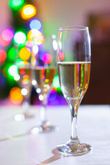 Three glasses of champagne, the first is in focus